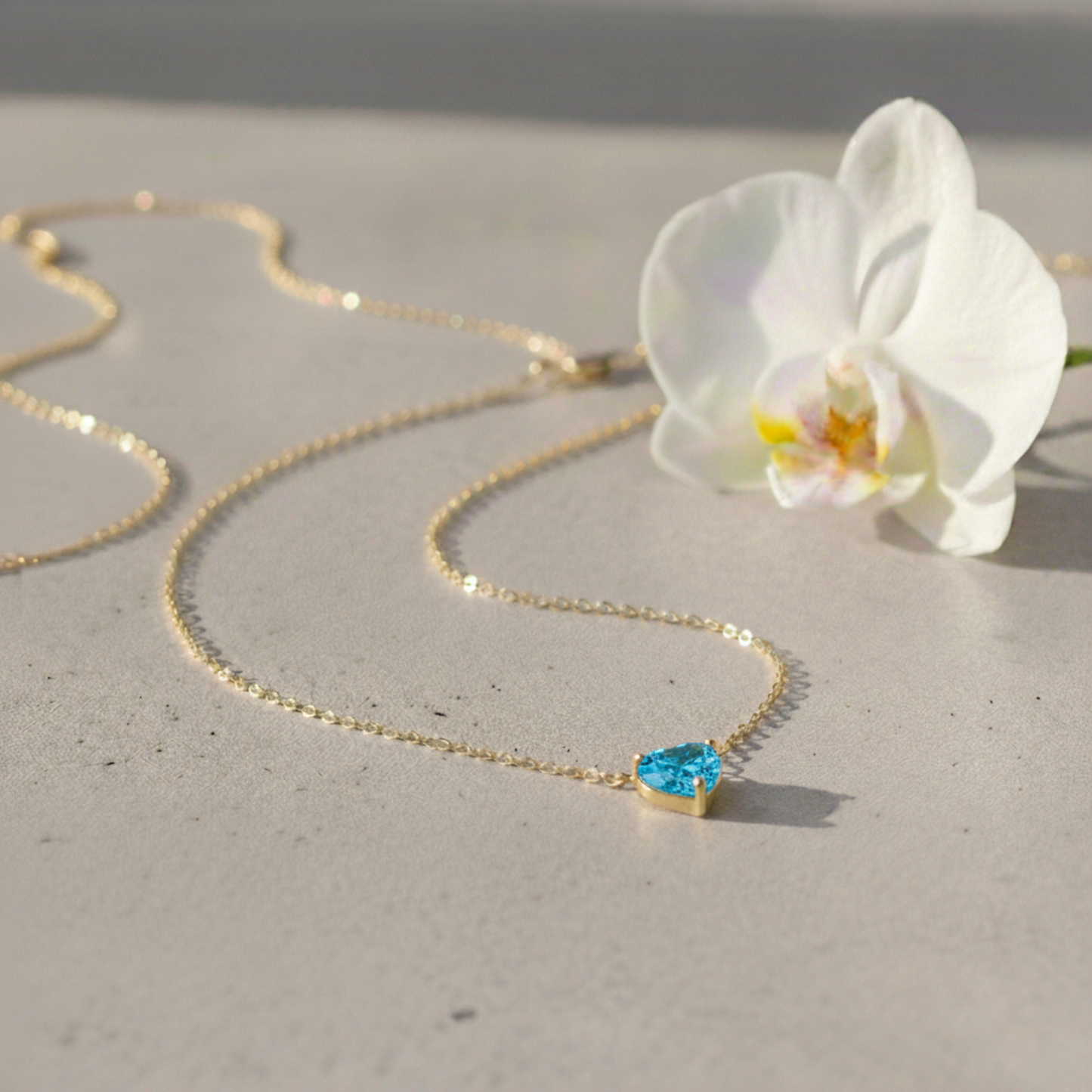 December – Blue Zircon