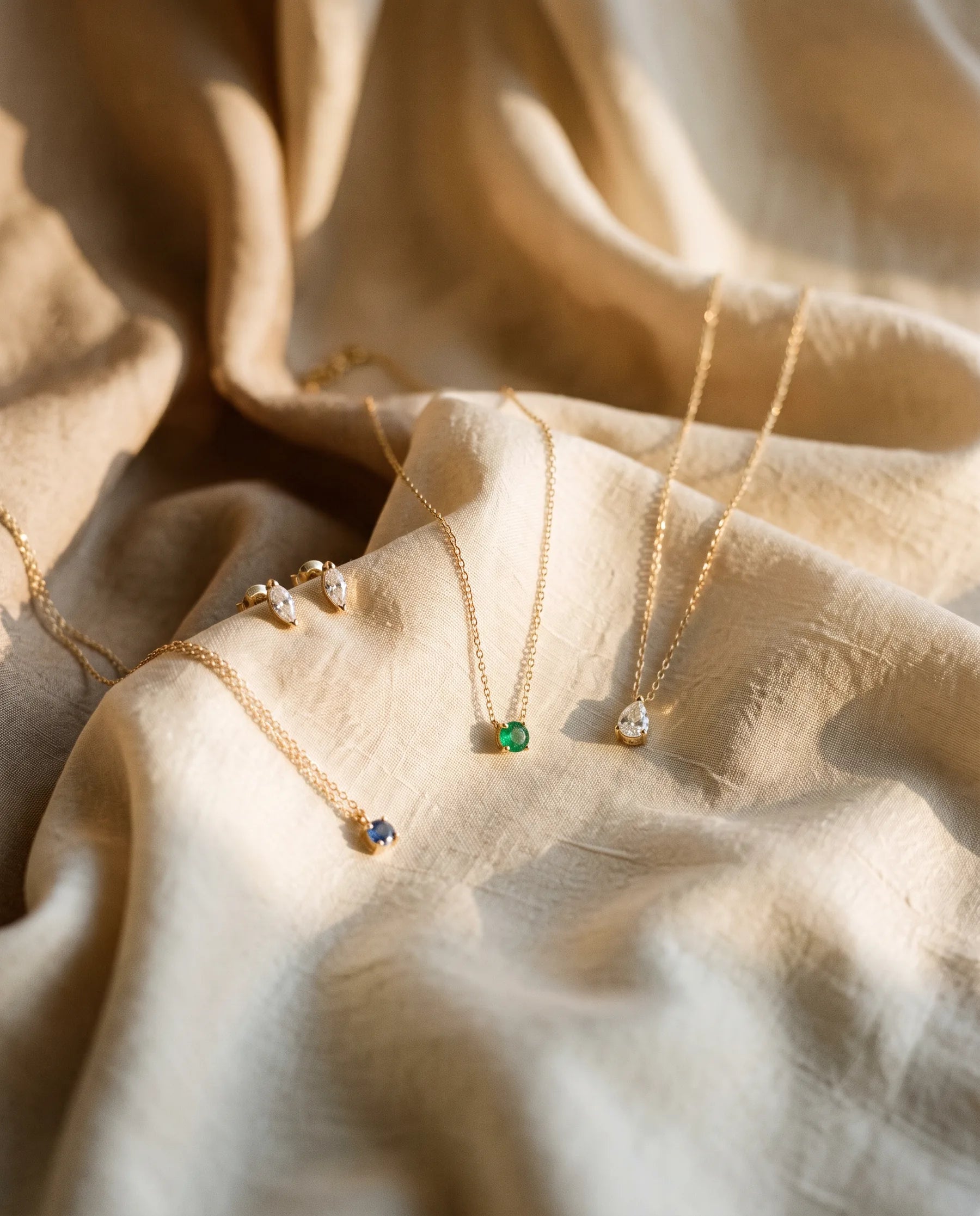 Fine chains resting on silk